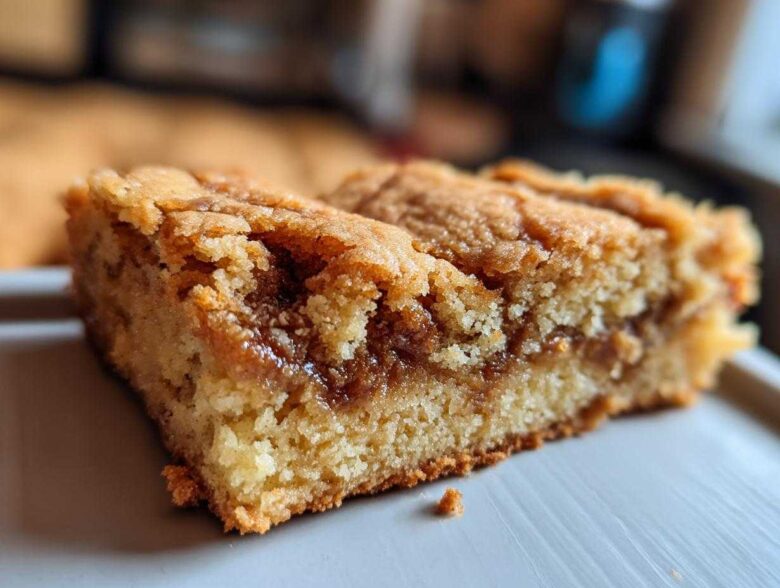 Close-up of a rich, golden Cookie Butter Blondie with a visible swirl of cookie butter.