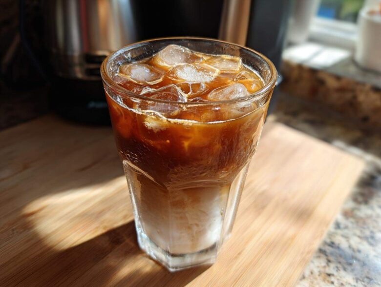 A refreshing glass of Vietnamese Iced Coffee with ice and creamy milk, ready to be enjoyed.